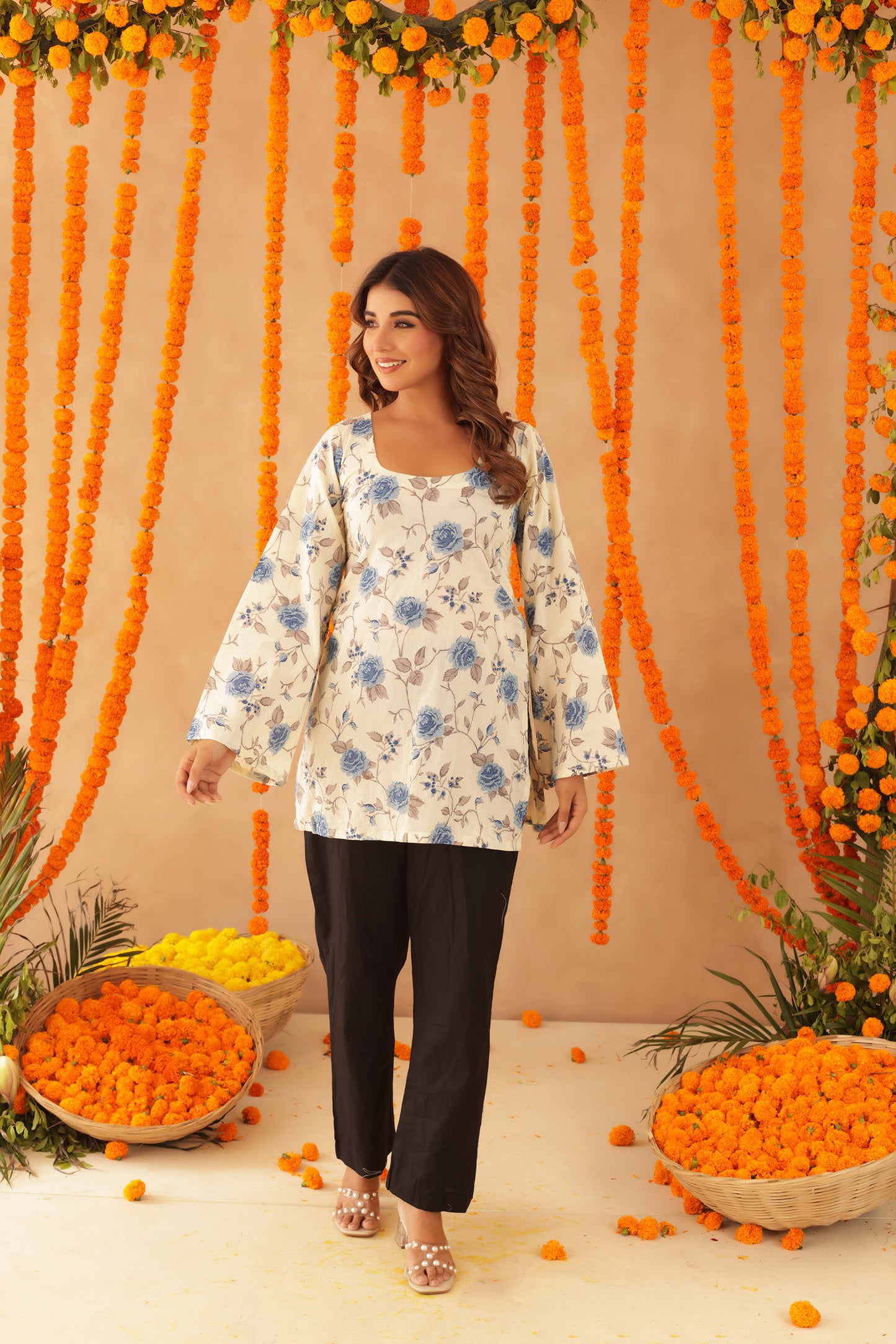 DIVISHA BLUE FLORAL COTTON BELL SLEEVES SHORT KURTI