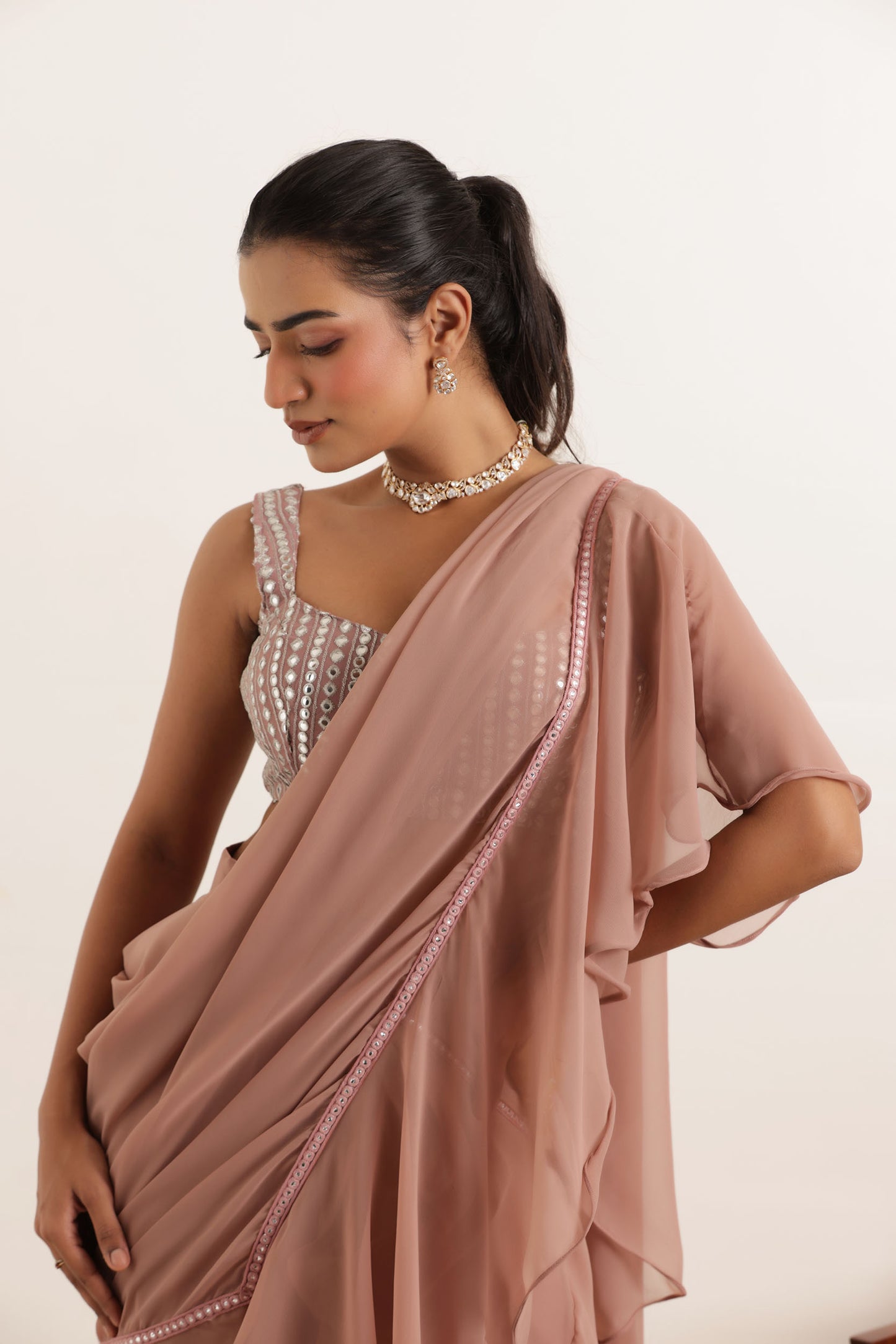 AMEERA MAUVE CHIKU RUFFLE PRE DRAPED LEHENGA SAREE SET Deasha India