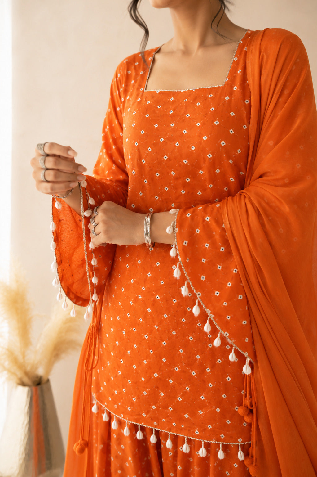 DIVYANGI ORANGE BANDHEJ FARSHI SET